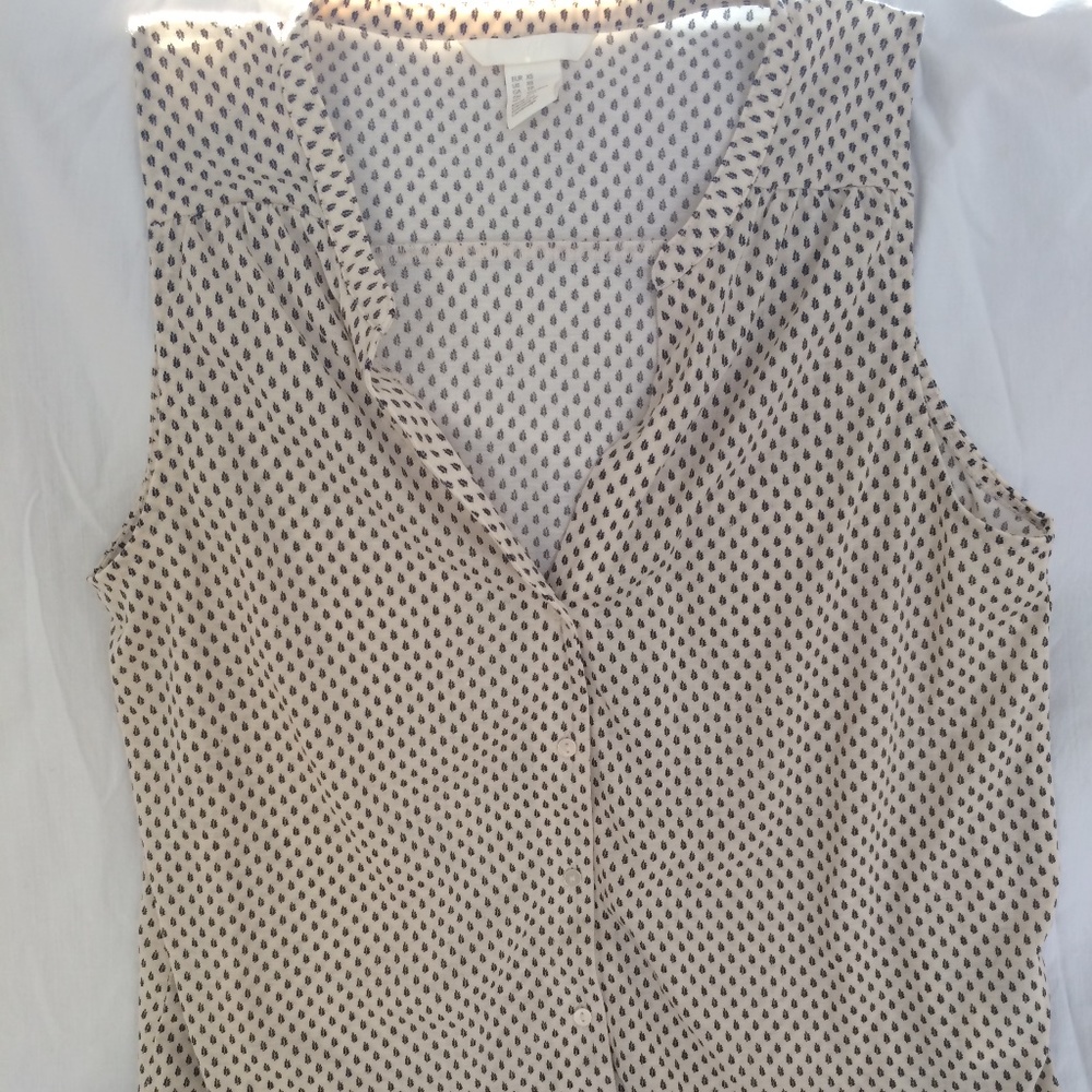 White collar tank top with black plant design